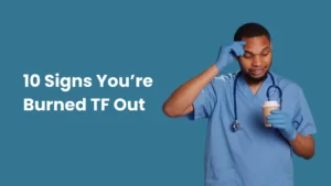 Nurse in scrubs holding coffee and looking fatigued, experiencing burnout